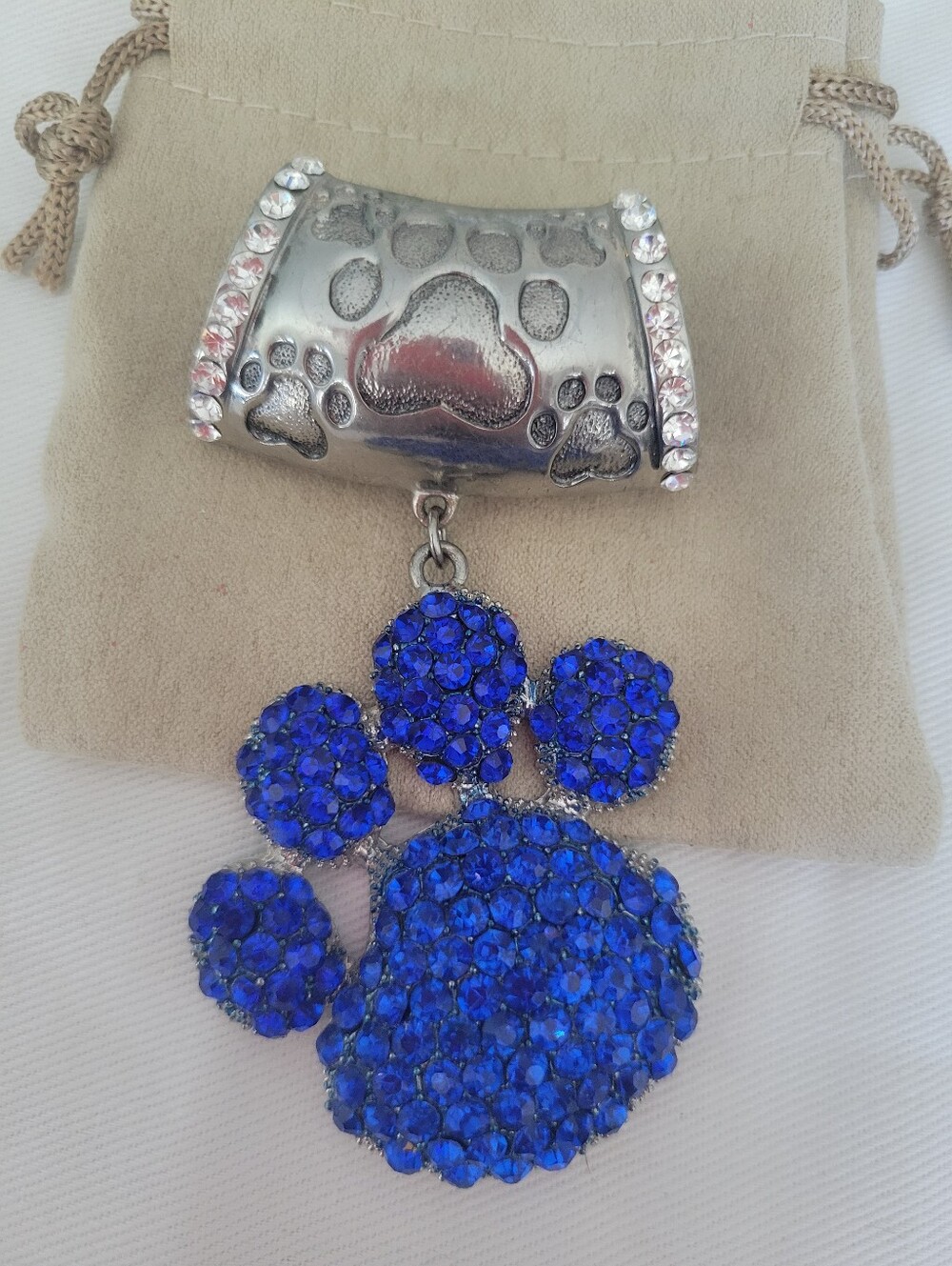 The O Boutique Blue Crystal Paw Pendant